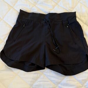 Women’s athletic shorts, black, size small, zippered pockets